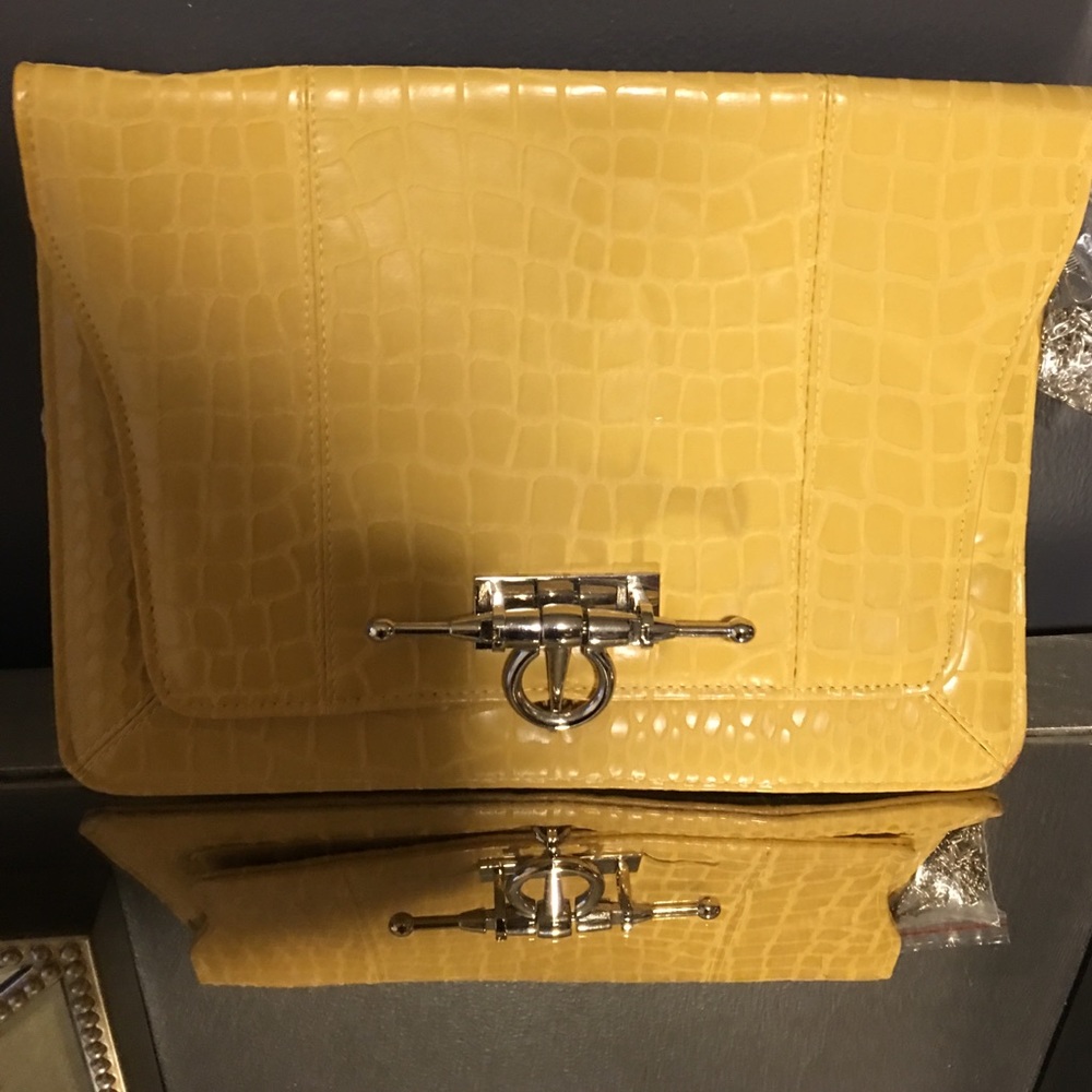 Yellow clutch with silver chain