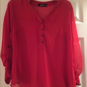 Red see-thru ana blouse.