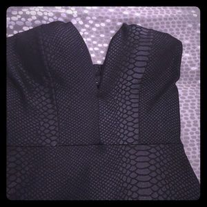 Snakeskin strapless little black dress