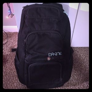 Black Dakine backpack