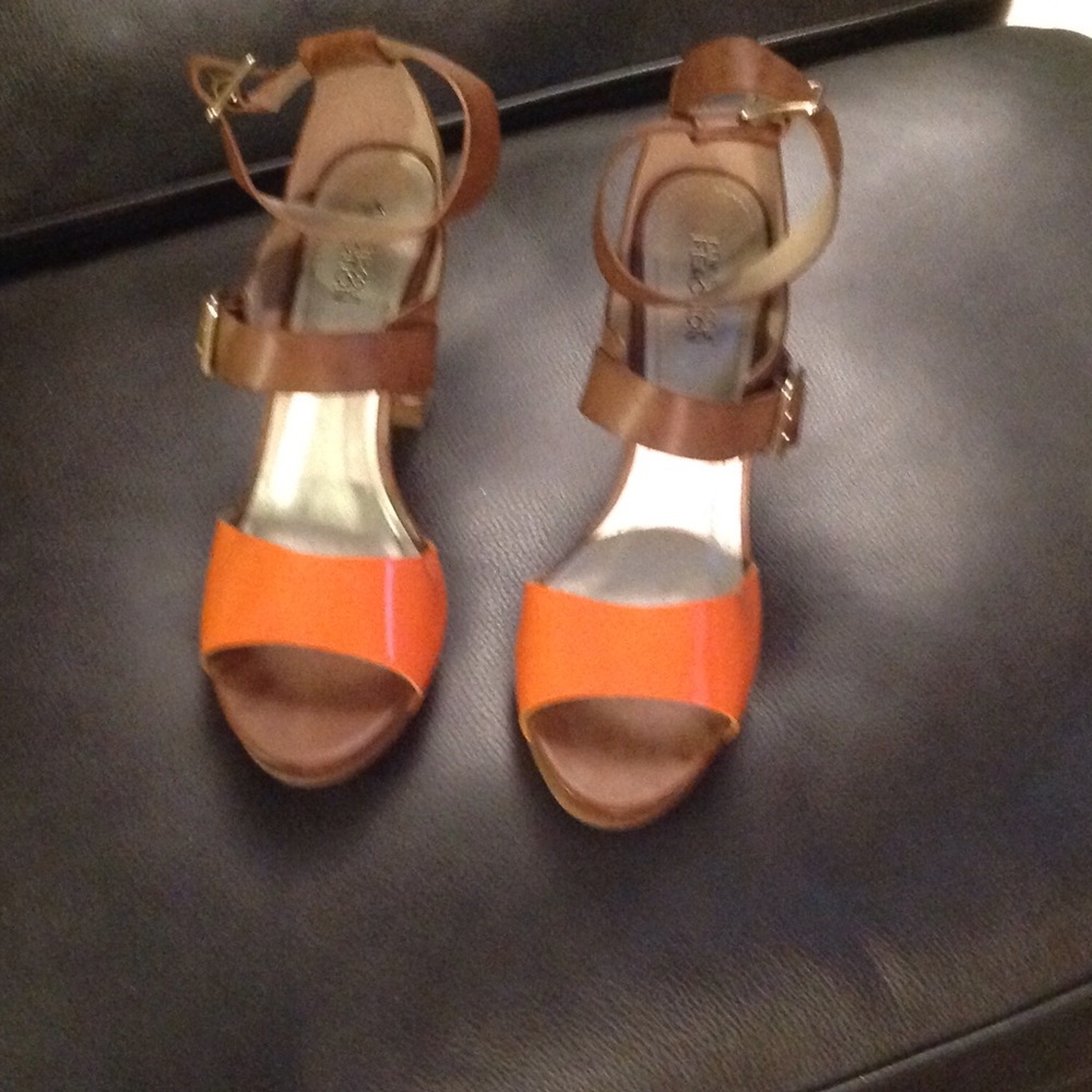 New orange patent and tan leather shoes
