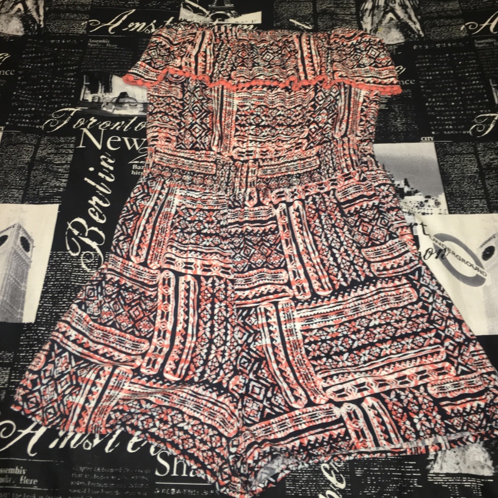 Orange and navy Aztec romper
