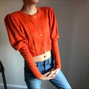 Shirring shoulder crop cardigan in orange.