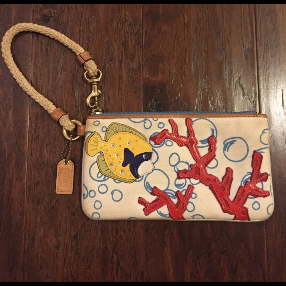 Coach coral reef wristlet