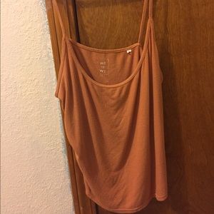Me to We peach colored crop tank top