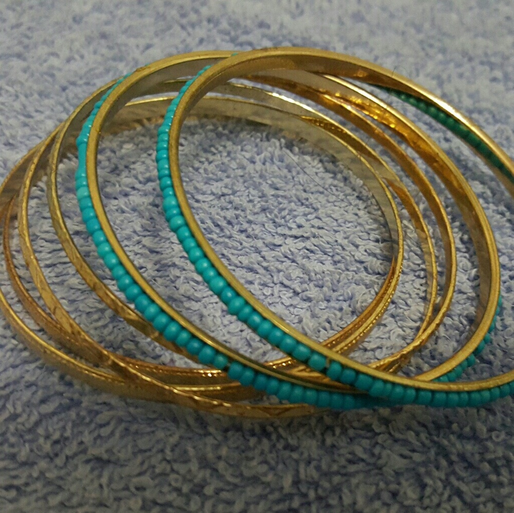Golden and teal hoop bracelets