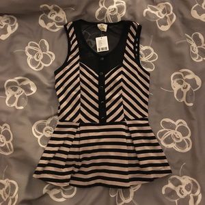 Sleeveless peplum top by Pins And Needles
