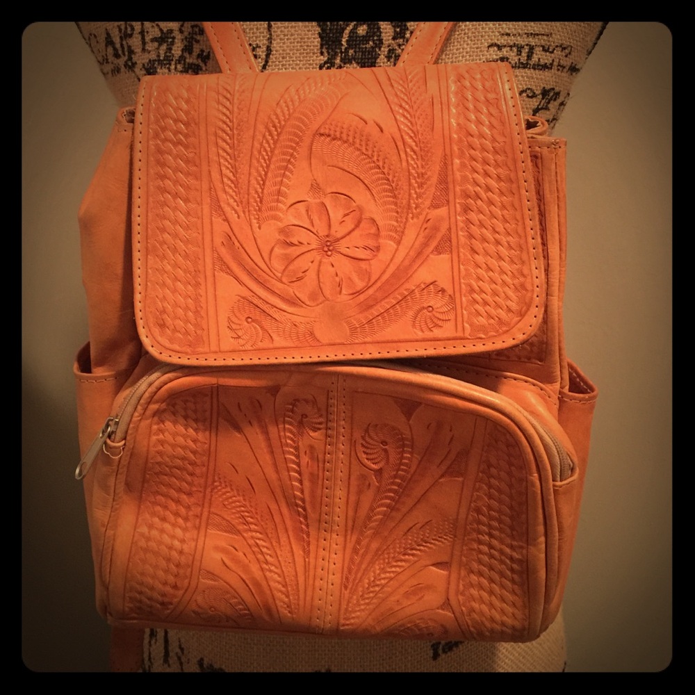 70s tooled leather backpack