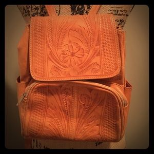 70s tooled leather backpack