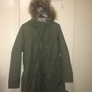 Army green utility jacket with furry hood.