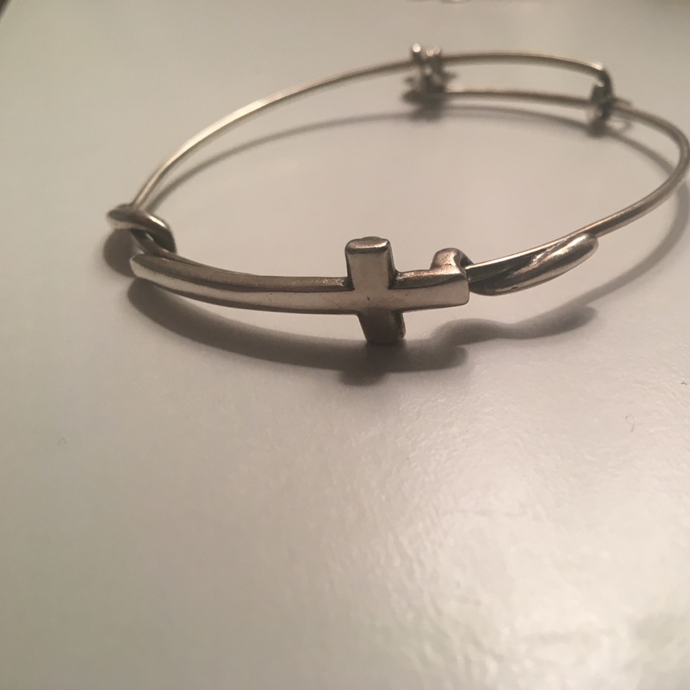 An Alex and Ani bracelet.