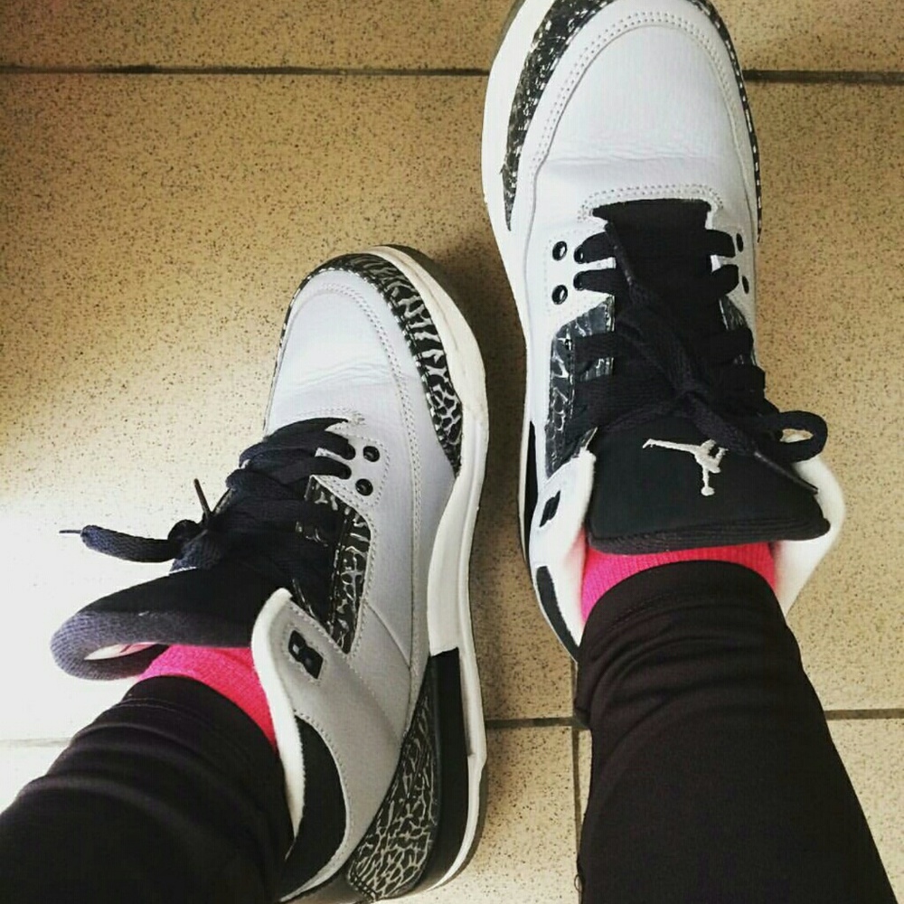 Air Jordan wolf grey 3's.