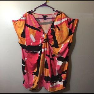 #7 Patterned orange and pink blouse