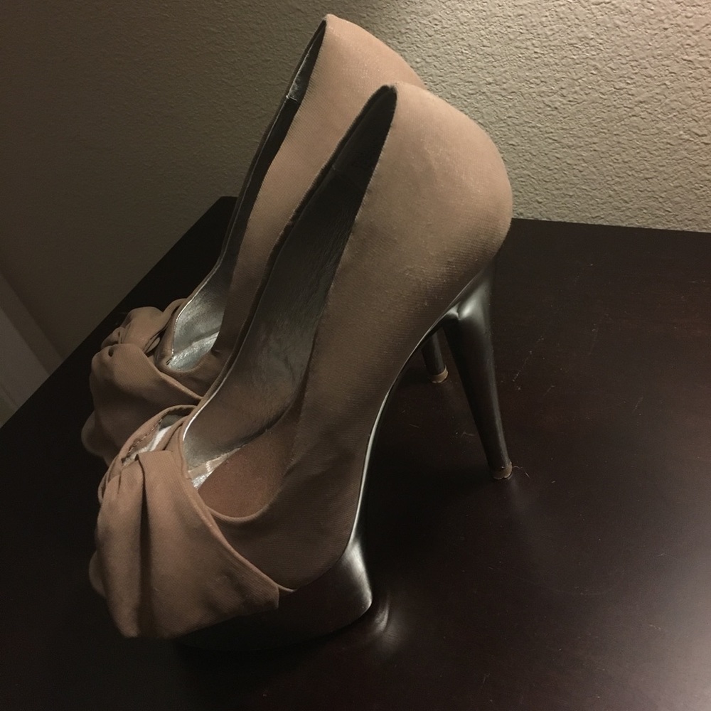 Platform peep toe pumps, tan with gun metal heel.