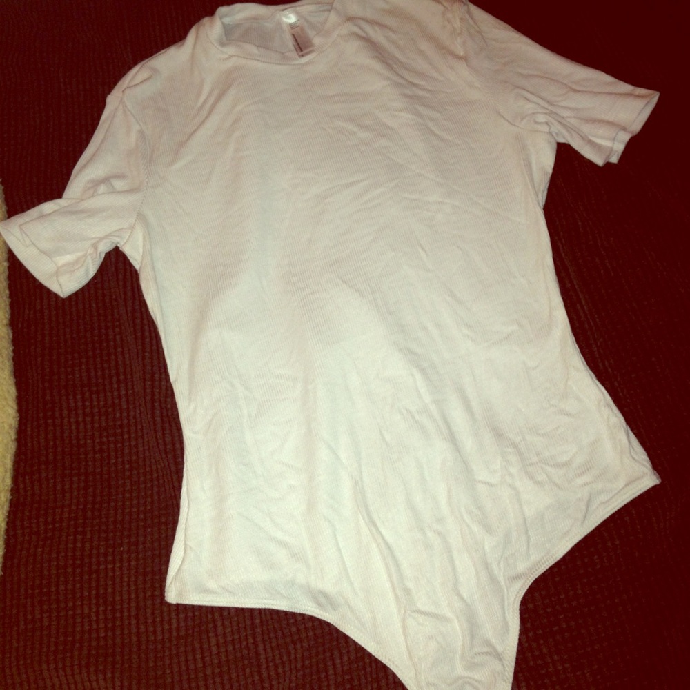 Body suit. (SOLD LOCALLY)