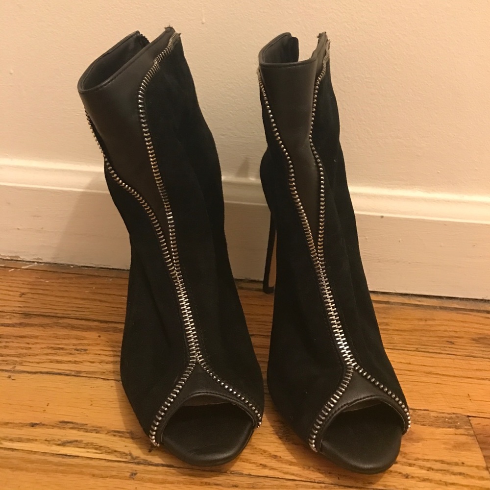 Black zipper high heel booties