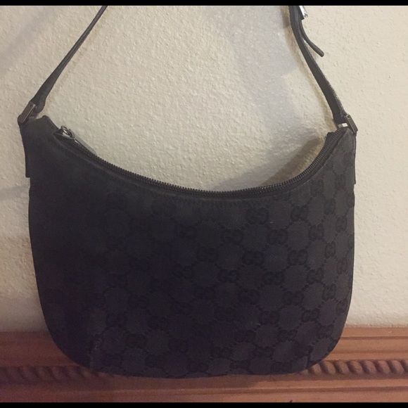 Gucci Handbags - Authentic Black Gucci bag and matching wallet.