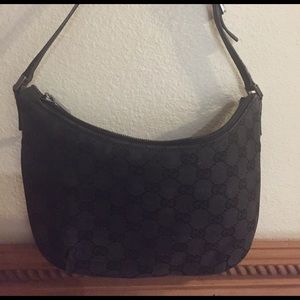 Authentic Black Gucci bag and matching wallet.