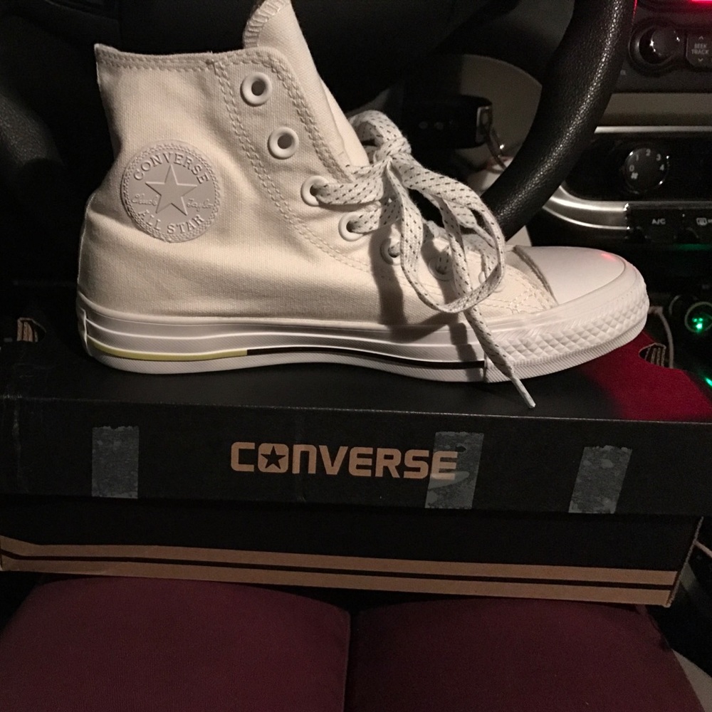 Brand new. Never used Converses
