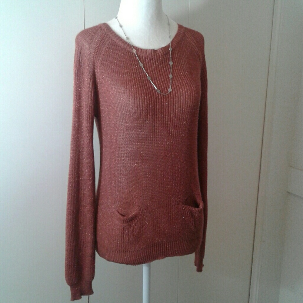 Long sleeved knit sweater with pockets and bow