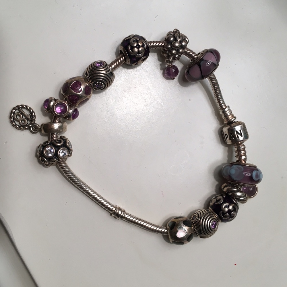 Authentic Pandora charm bracelet. Charms come with