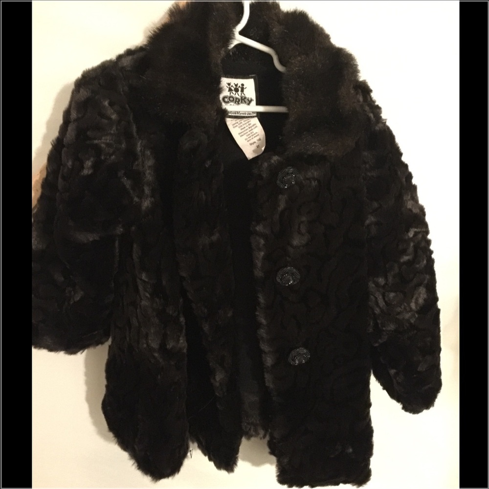 This is a fluffy faux fur type jacket by Corky