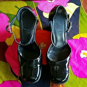 Gently used patent leather wedge