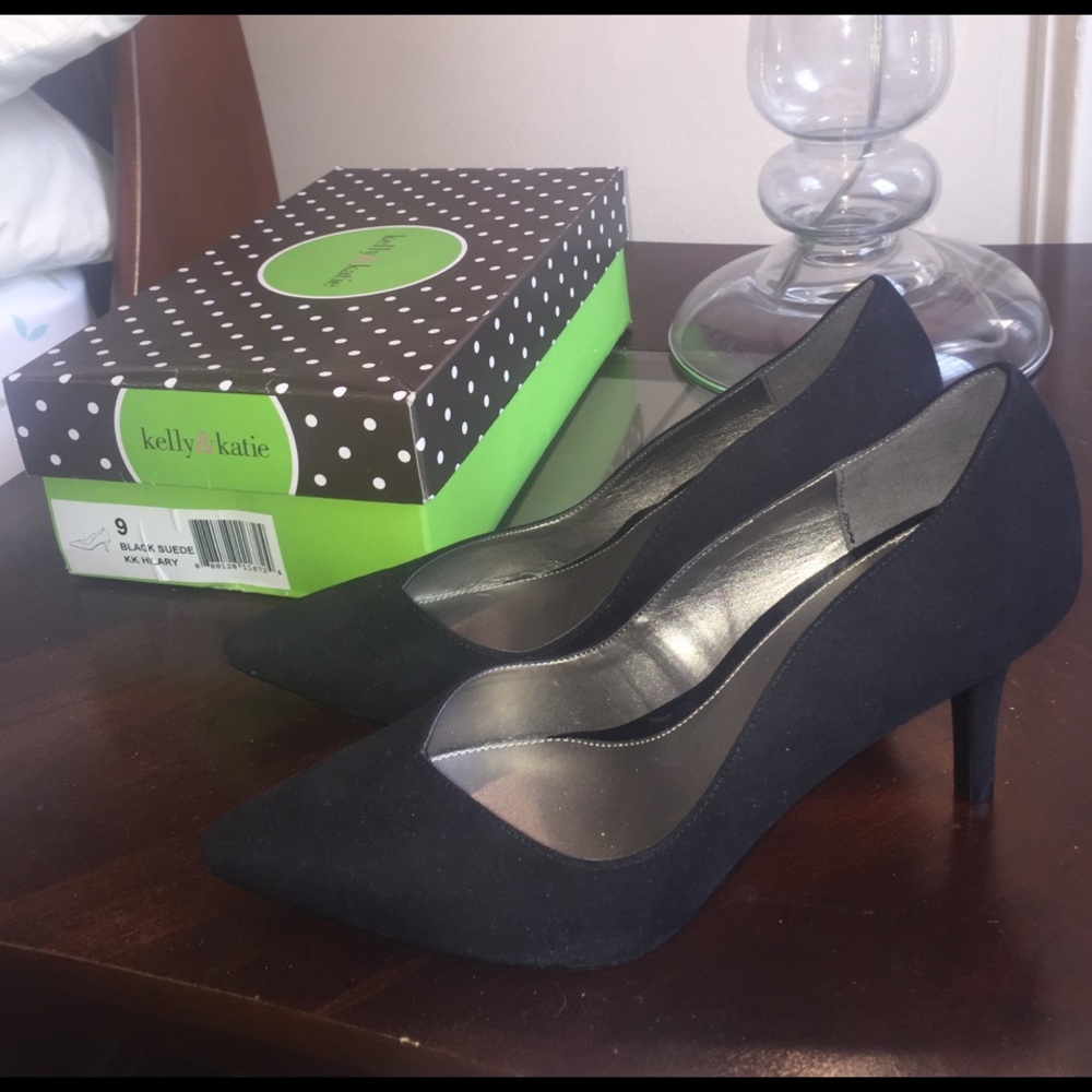 Brand new black suede shoes.