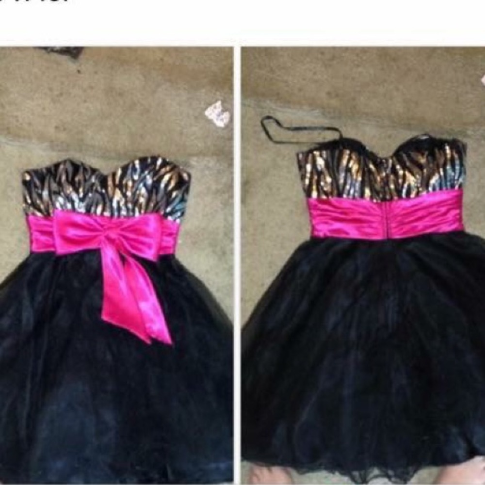 Size 3/4, worn for 2 hours, zebra/black dress.