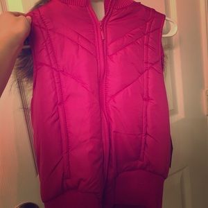 Hot pink puffy vest with fur hood
