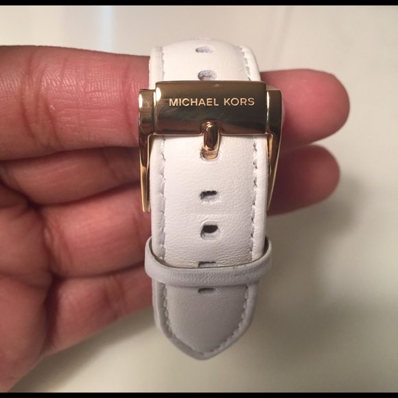 Micheal Kors white chronograph watch.