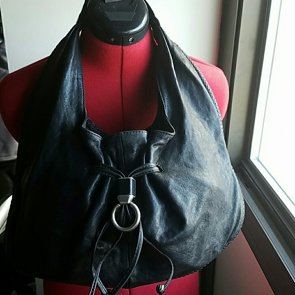 Black leather medium size Cole Haan bag