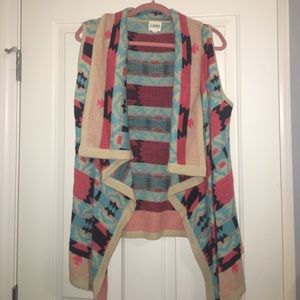 Colorful Aztec sweater vest perfect for fall