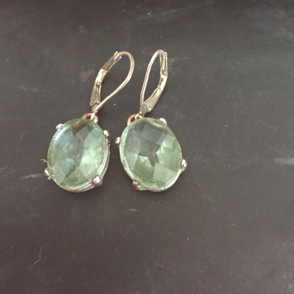 Beautiful earrings w/ Amethyst stone. Lobster clap