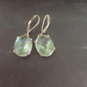 Beautiful earrings w/ Amethyst stone. Lobster clap