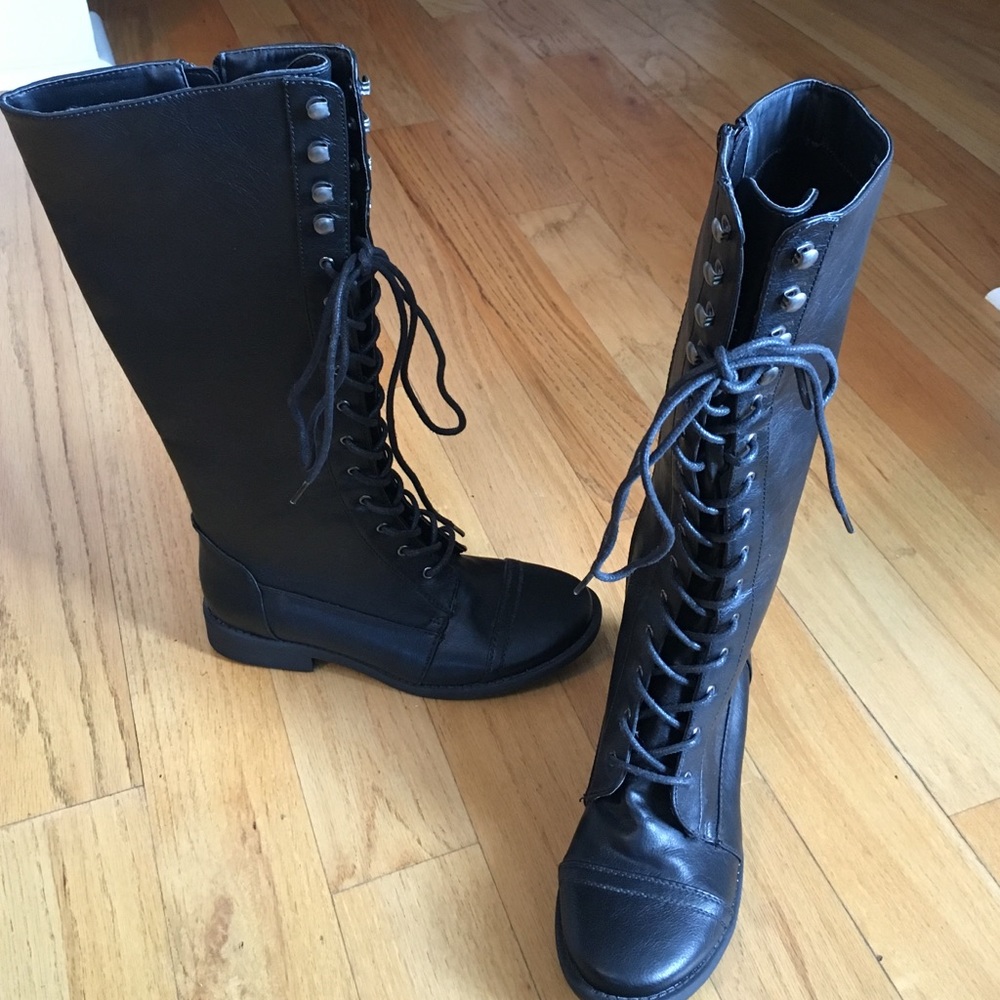 Tall lace up boots