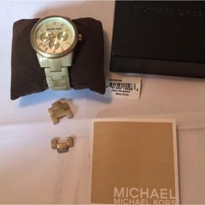 Gold tone watch with tortoise details