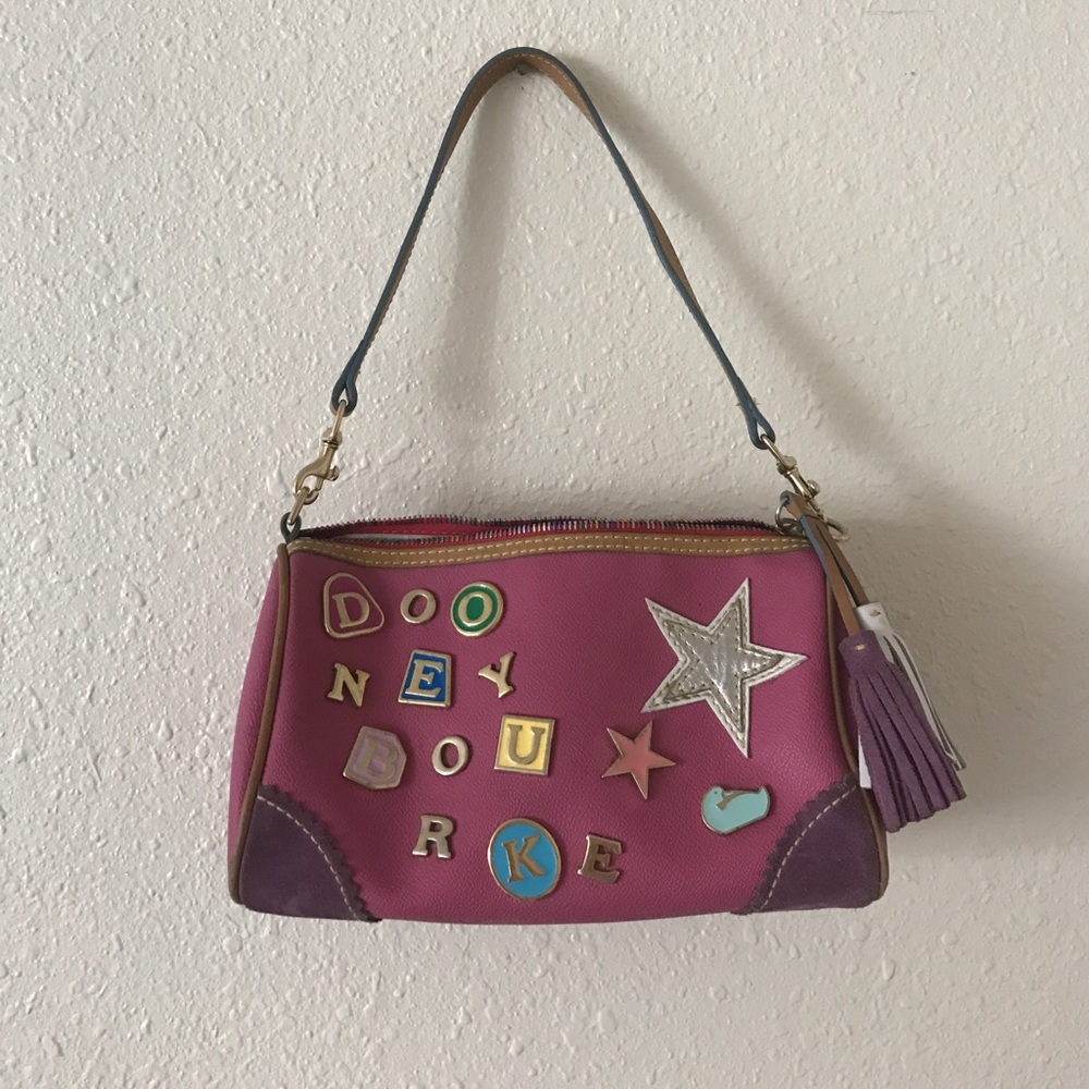 Dooney and Bourke small leather purse. Authentic