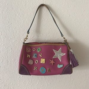 Dooney and Bourke small leather purse. Authentic