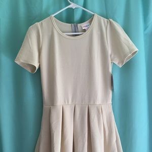 Lularoe Amelia size Small, cream NWT
