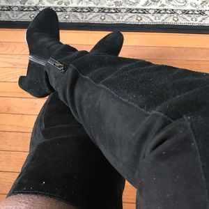 Thigh high Swede boots