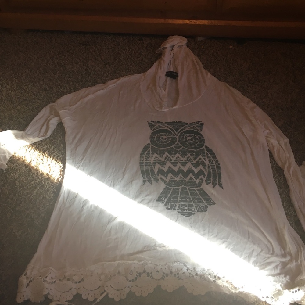 A long sleeve hoodie shirt with an owl