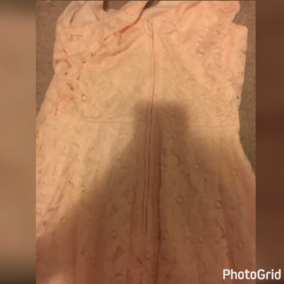 A pink lace dress with a sipper in back - Picture 2 of 3