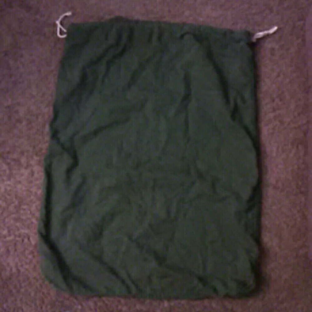 Army green laundry bag with drawstrings