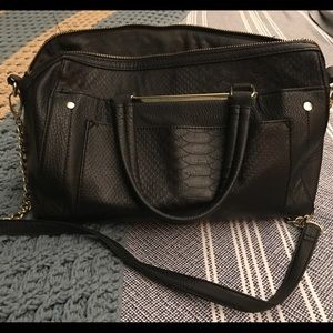 Embossed black shoulder bag
