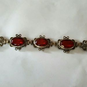 Stunning costume jewelry bracelet red glass stones