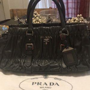 Gray tufted Prada bag