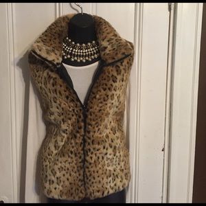 Leopard faux fur reversible vest.