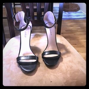 Black Breckelle's ankle strap heels