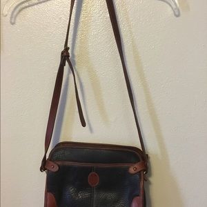 Two Dooney and Bourke purses in good shape.